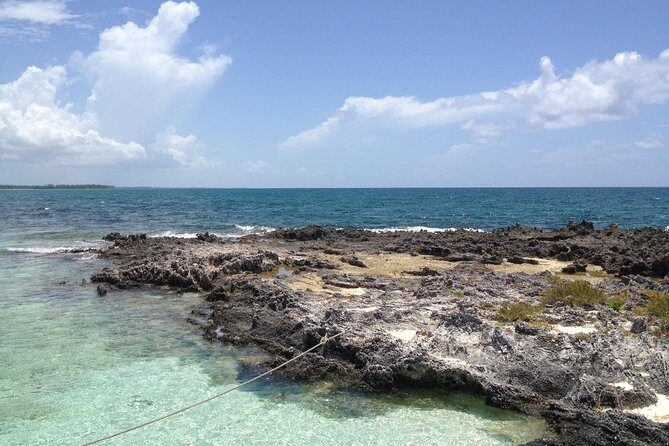 Freeport Snorkeling Peterson Cay National Park and Hotel Day Pass - In-water experience: gear, guide help, and how spotting works