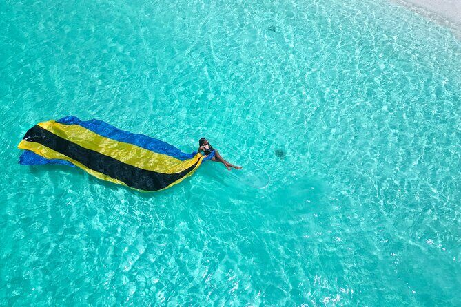Nassau Clear Kayak Drone Photoshoot- Floating Dress - Saunders Beach in Nassau: Why the location matters for your photos