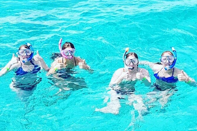 Powerboat and Snorkel Experience with Swimming Pigs and Turtles - Beach time at Sandy Cay and the included drinks break