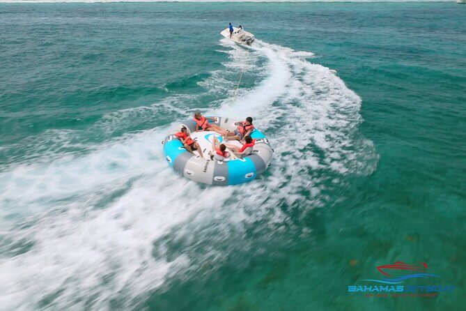 The Ultimate Bahamian Beach Day: Pigs, Jet Ski, Snorkeling & More - The private beach club: rum punch, swings, and water toys